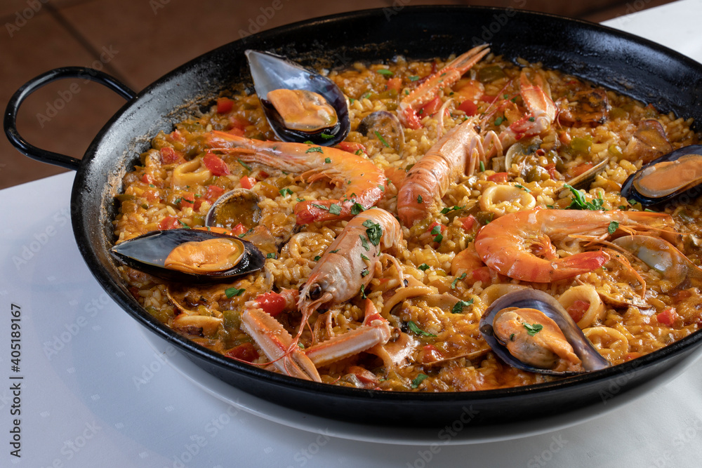 Spanish seafood Paella ,with crayfish, squid, mussel and prawn Spanish seafood Paella ,with crayfish, squid, mussel and prawn