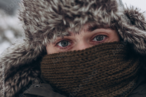 portrait of a person in a fur cap