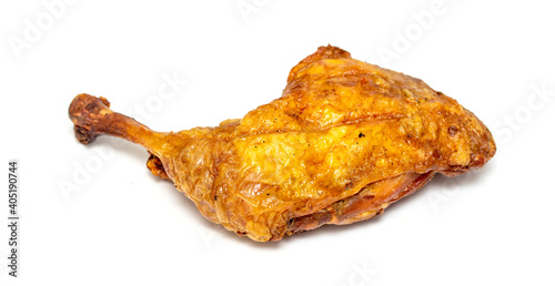 fried chicken leg on a white plate