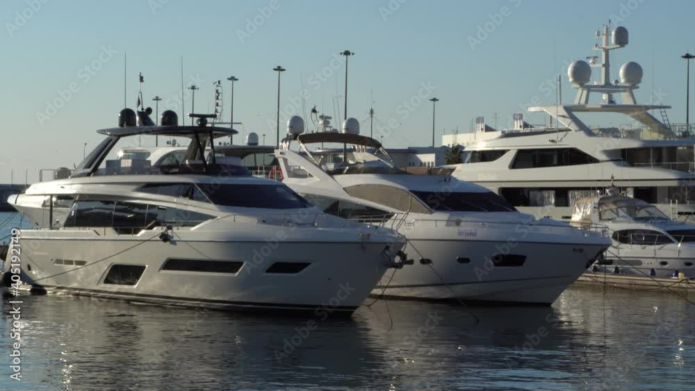 Main building of Marine Station. Motor ships and yachts on marinas. Calm Black Sea. Sochi Commercial Seaport. Close-up. Winter day.Sochi, Russia
Main building of Marine Station. Motor ships and yachts on marinas. Calm Black Sea. Sochi Commercial Seaport. Close-up. Winter day.Sochi, Russia