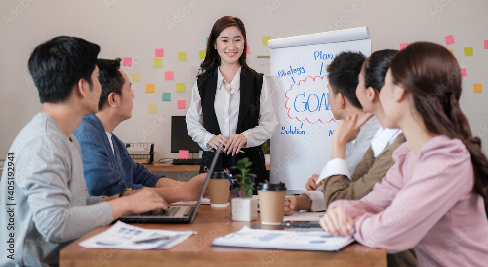 Group of Business putting forward suggestions to colleagues. Startup business team on meeting in modern bright office.They smiling and enjoying each others. Group of Business putting forward suggestions to colleagues. Startup business team on meeting in modern bright office.They smiling and enjoying each others.