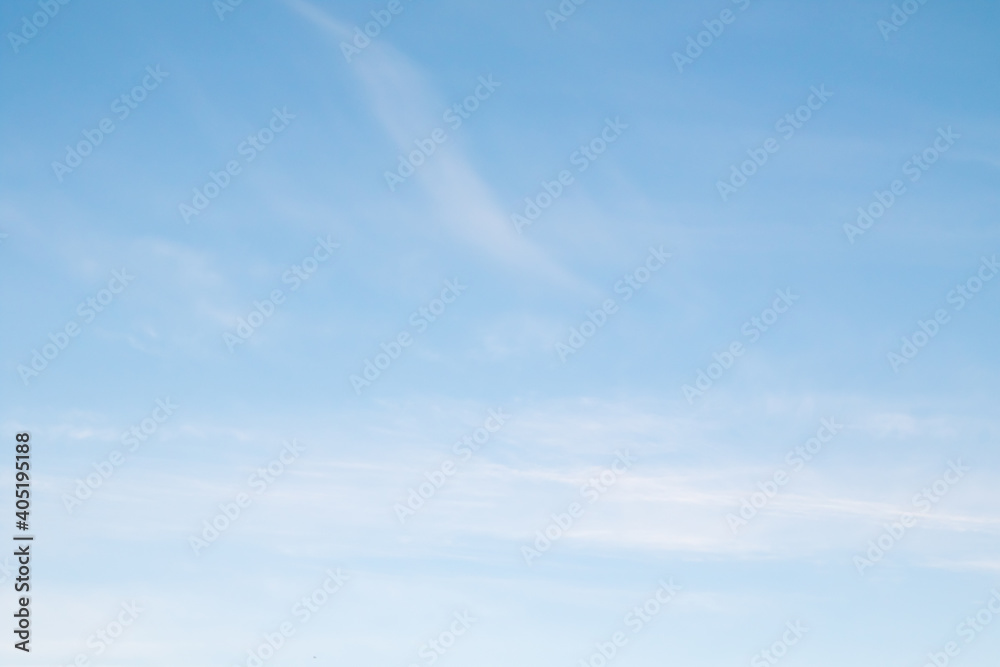 blue sky with a haze of white clouds - obrazy, fototapety, plakaty 