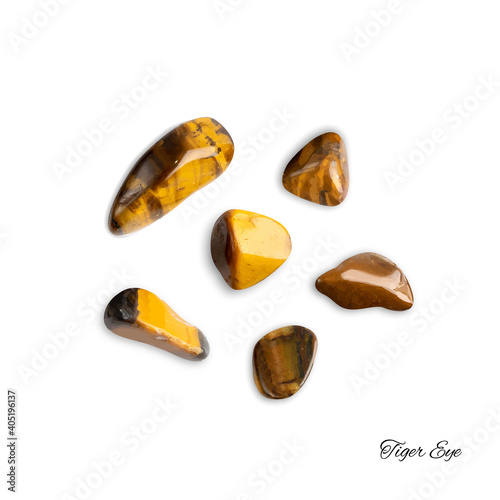 Tiger eye pebbles isolated, brown polished quartz stones