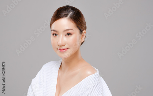 Beauty asian face of the young beautiful woman skin natural make up.  close up face pretty portrait spa and salon in bathing suit concept