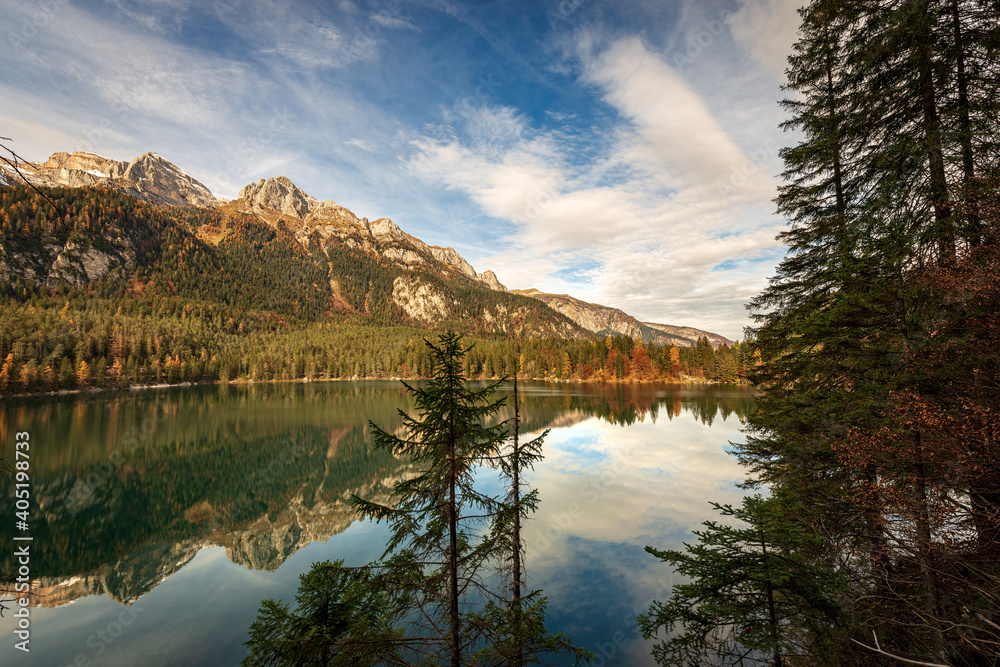 Small and beautiful lake in Italian Alps. Lago di Tovel (Lake Tovel), National Park of Adamello Brenta. Trentino Alto Adige, Trento province, Italy, Europe.