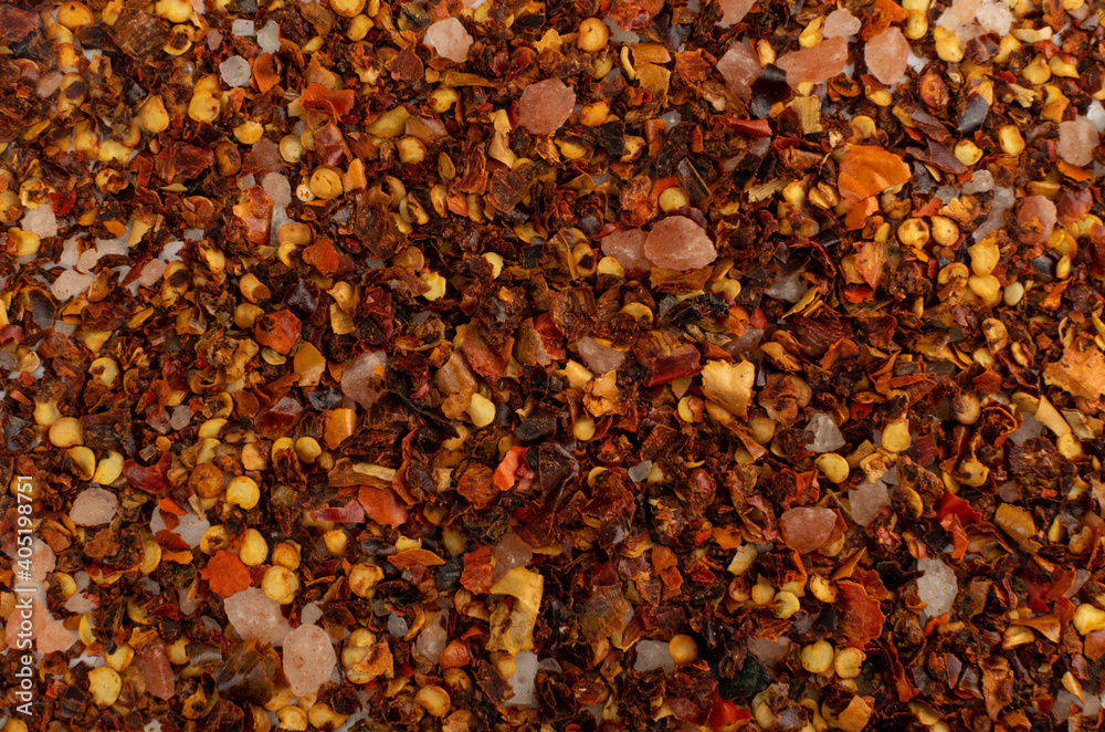 Red Chilli Pepper Flakes with Seeds Texture Background Red Chilli Pepper Flakes with Seeds Texture Background