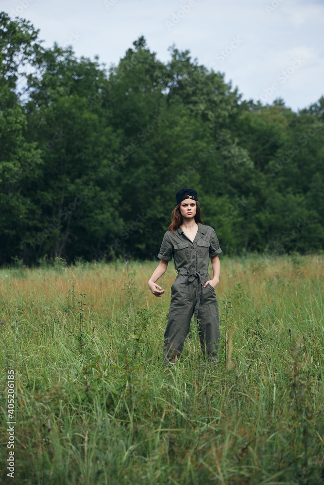 Woman in the field Tall green grass fresh air walk 