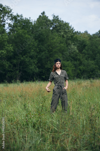 Woman in the field Tall green grass fresh air walk  © SHOTPRIME STUDIO