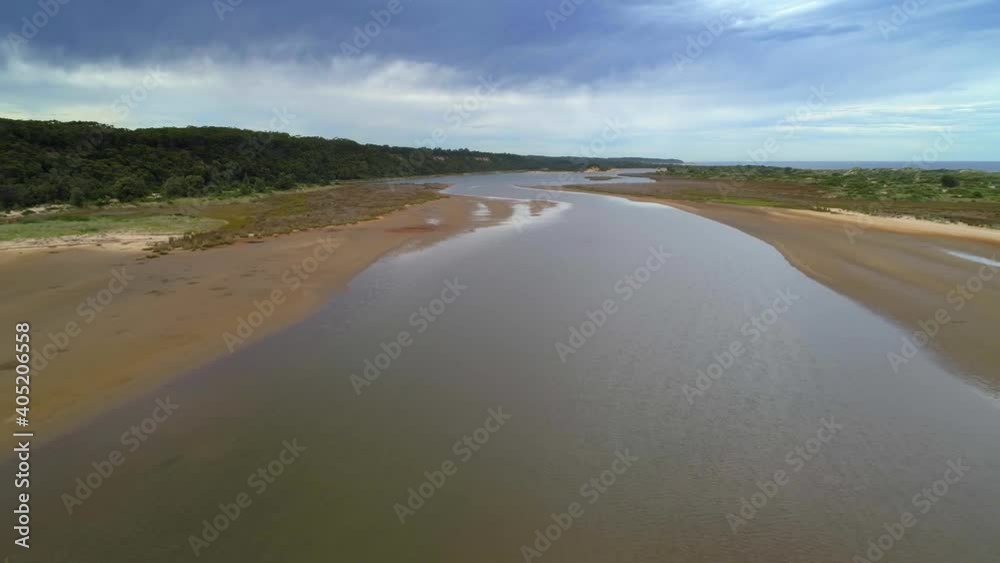 Flight low over water at ocean coastline in Australia Flight low over water at ocean coastline in Australia
