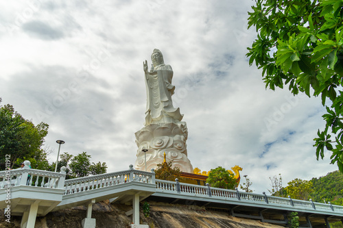 big statue of guanyin bodhisattva on mount in Ho Quoc pagoda (Vietnamese name is Truc Lam Thien Vien) with , Phu Quoc island, Vietnam