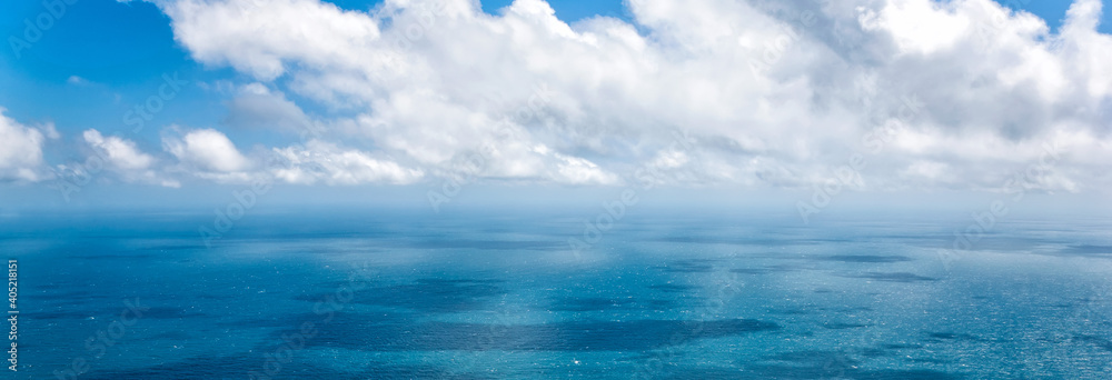 Panoramic seascape with clouds on a sunny day