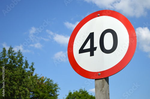 Billede på lærred Road sign of speed limit with the number 40.