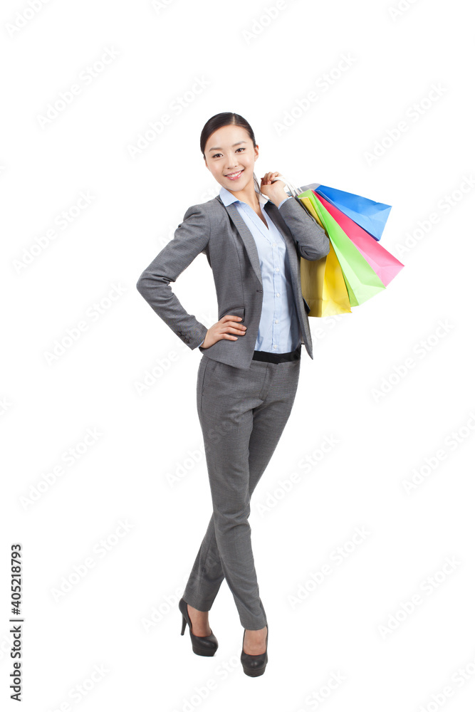 A happy Young woman holding shopping bags A happy Young woman holding shopping bags