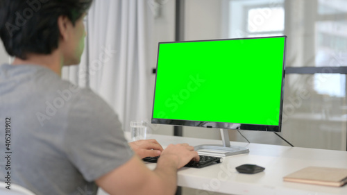 Businessman Using Desktop with Green Chroma Key Screen