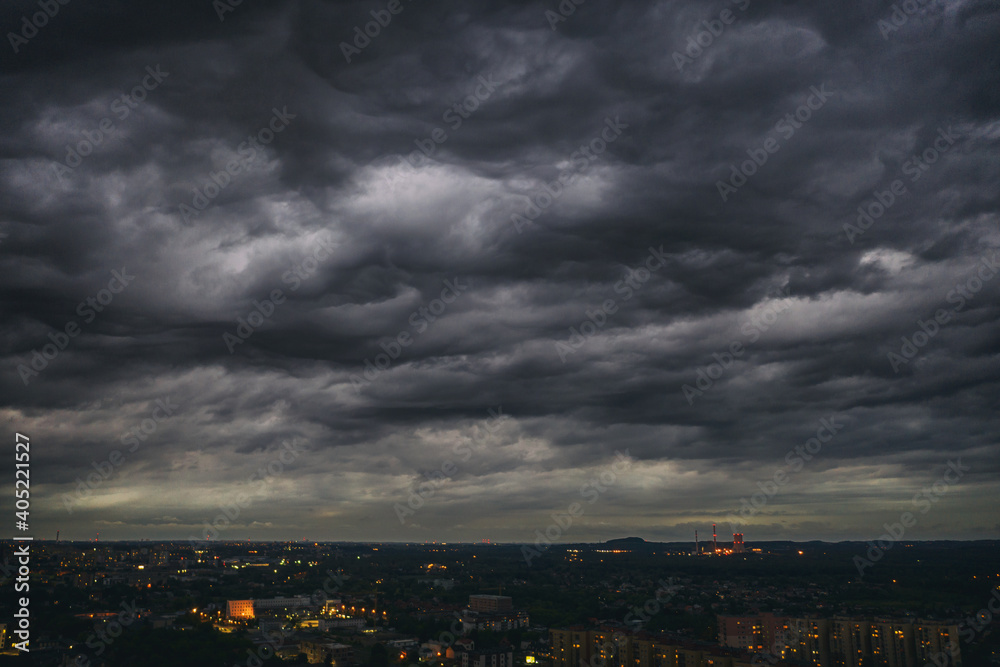 Dark sky, with black scary clouds above the city. Dabrowa gornicza, silesia, Poland, aerial drone view
