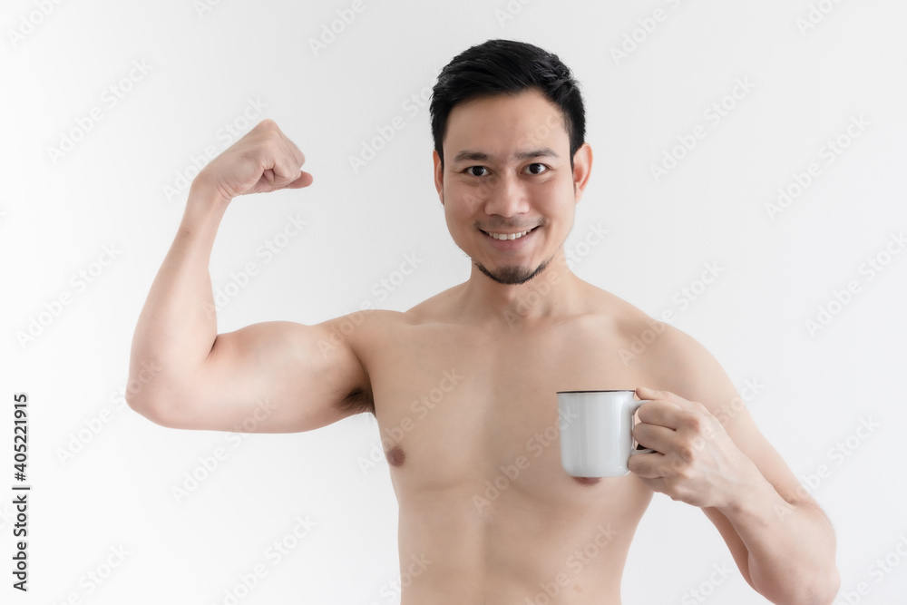 Topless healthy Asian man drinks the healthy coffee on isolated background.