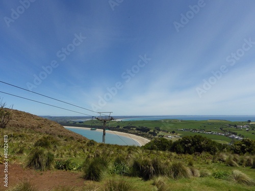 cable car on the mountain. The beautiful landscape of Stanley City from the  top surround with coastal ,beach,grasses  , small city with pole of the nut chairlift  TASMANIA AUSTRALIA © decha