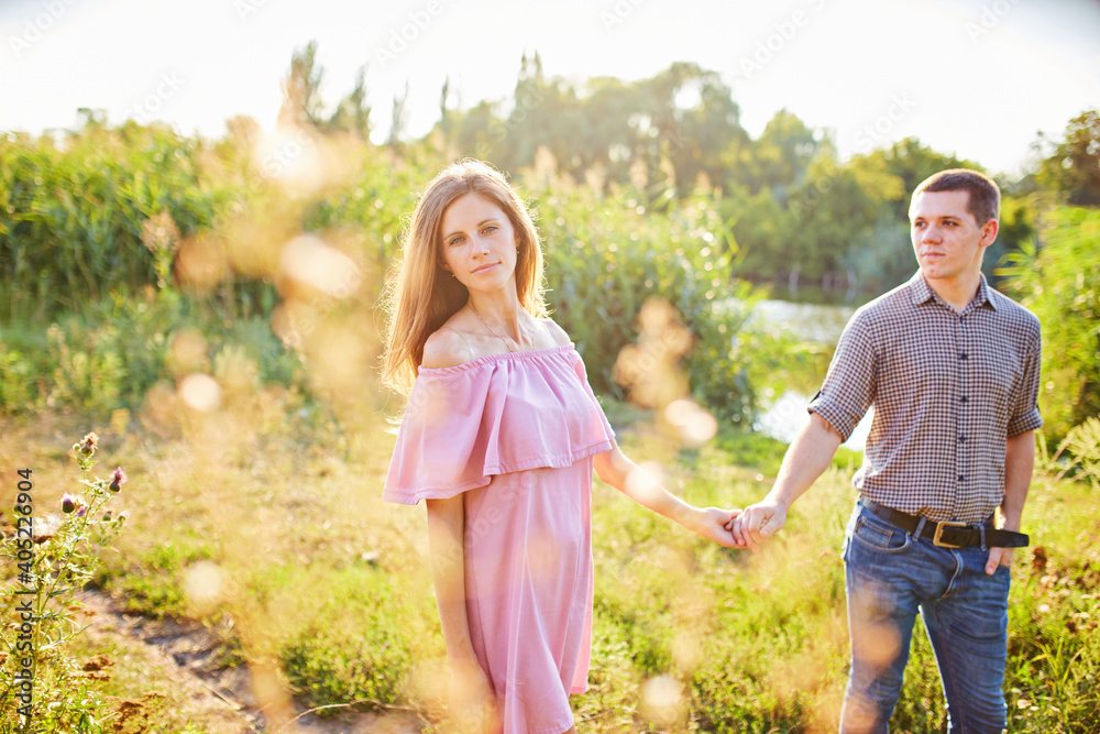 Fototapeta premium Portrait of young couple in summer