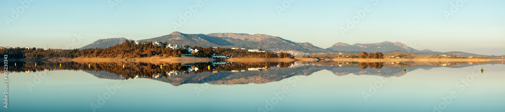 Obraz premium panorama landscape in Orellana with mountains mirroring in lake