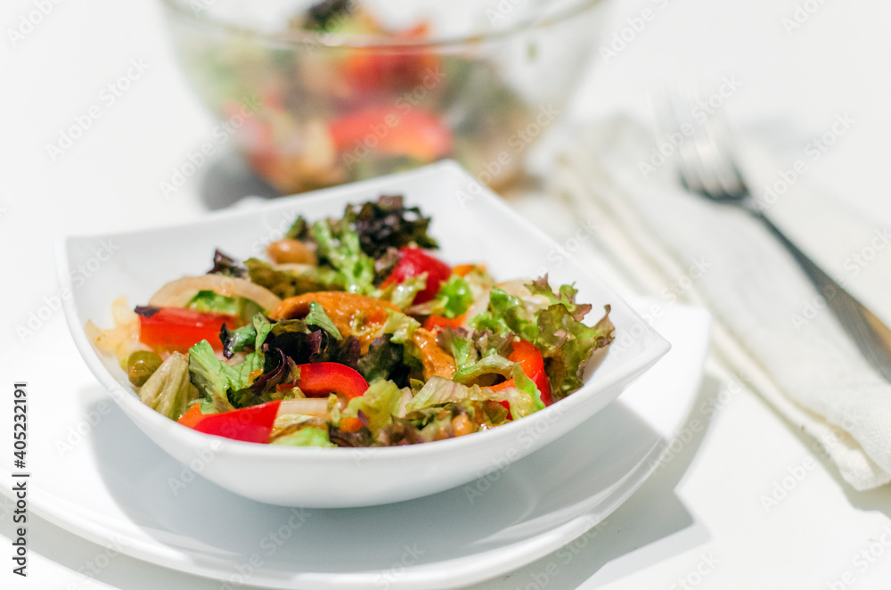 Salmon and beans salad with vegetables