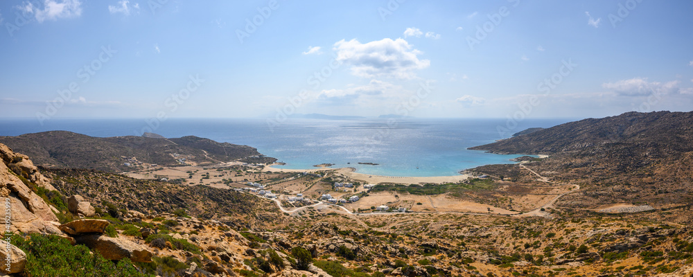 Manganari beach on Ios island, one of the most picturesque beaches with golden sand and crystal waters. Cyclades, Greece