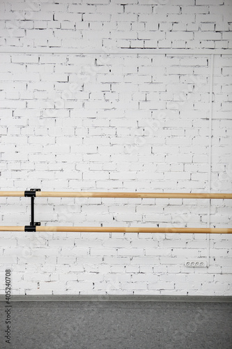 ballet barre in a studio with white walls
