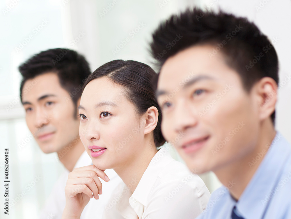 Group of business people sitting at conference table Group of business people sitting at conference table
