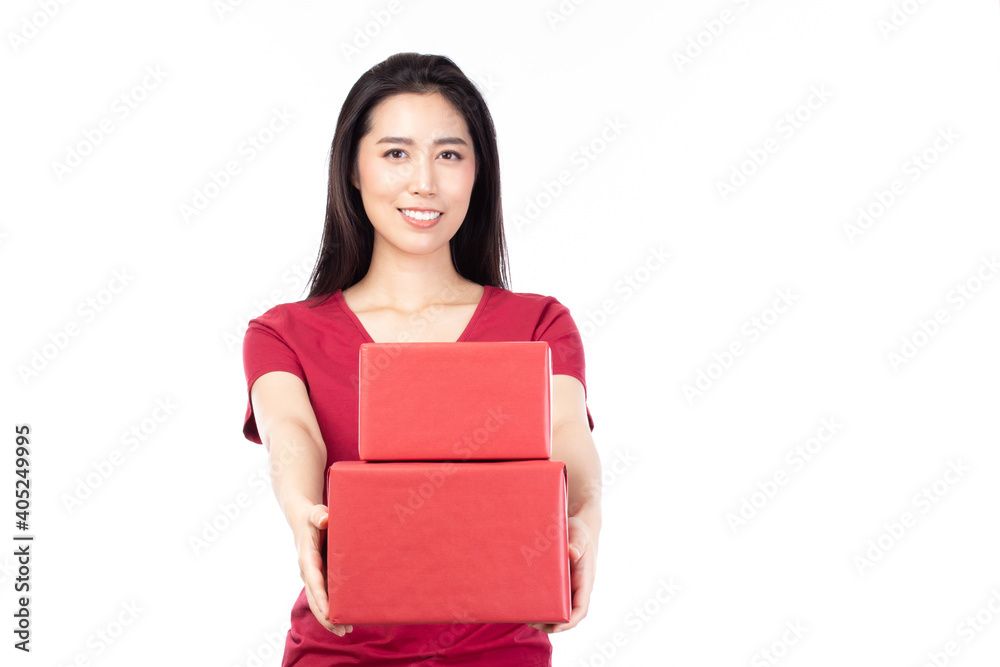 Happy pretty young woman holding gift box present in christmas or new year on white background. Happy pretty young woman holding gift box present in christmas or new year on white background.