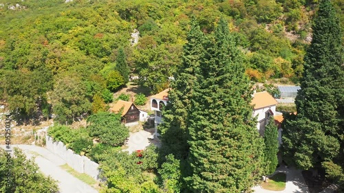 Top view from drone. Dulevo (Duljevo) monastery complex. The courtyard of the Dulyovo monastery. The Dulevo monastery complex consists of the Church of St. Archdeacon Stephen, pilgrimage premises.
 photo