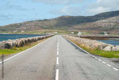 The causeway connecting Eriskay and South Uist islands, Outer Hebrides, Scotland, UK photo
