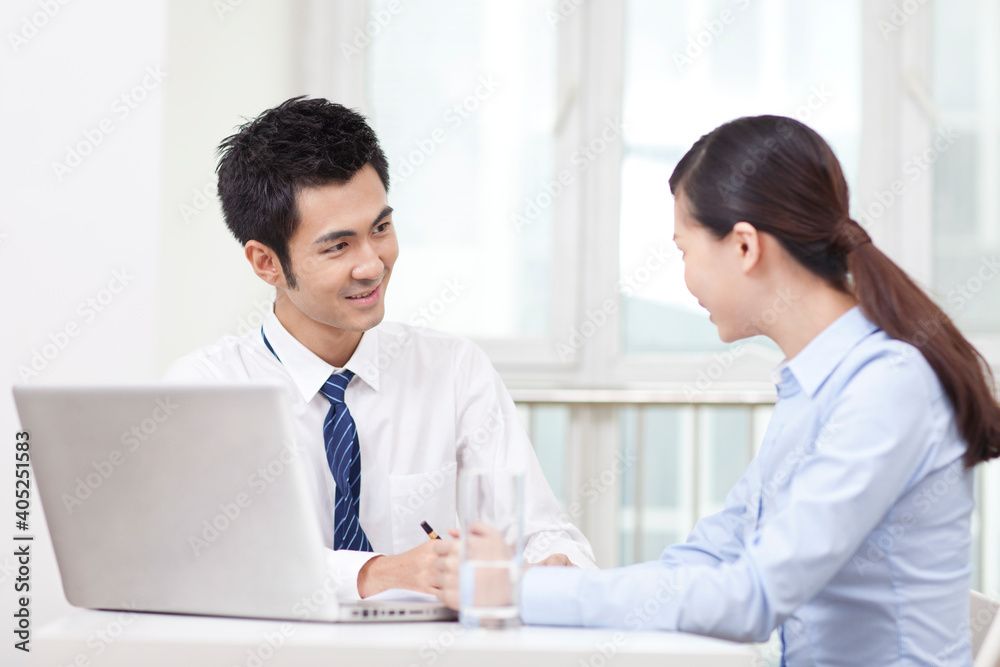 Group of business people discussing in office Group of business people discussing in office