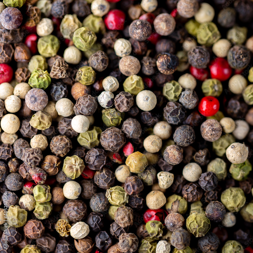 Assorted peppers.A mixture of peppers.Various sharp stoves.Mix of dry round hot red pepper, black pepper, white pepper, green pepper, background.Background for the kitchen.Background from peppercorns. Assorted peppers.A mixture of peppers.Various sharp stoves.Mix of dry round hot red pepper, black pepper, white pepper, green pepper, background.Background for the kitchen.Background from peppercorns.