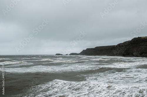 waves crashing on rocks