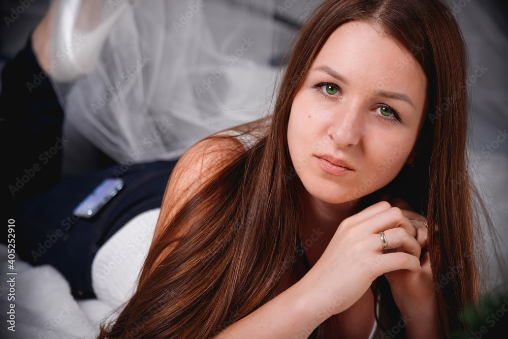 Fototapeta premium Portrait of a beautiful girl with long hair.