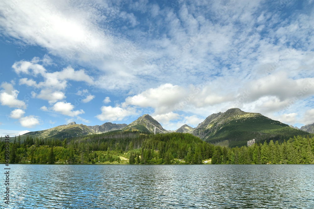 Mountain lake Strbské pleso in the High Tatras National Park. View of the ski jump, Strbske pleso, Slovakia, Europe.