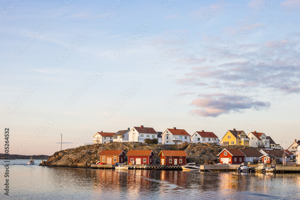 A beautiful cityscape of the fisherman village, Klädesholmen, in the sunset on the Swedish west coast, Sweden