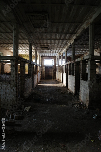 interior of old dirty abandoned stable