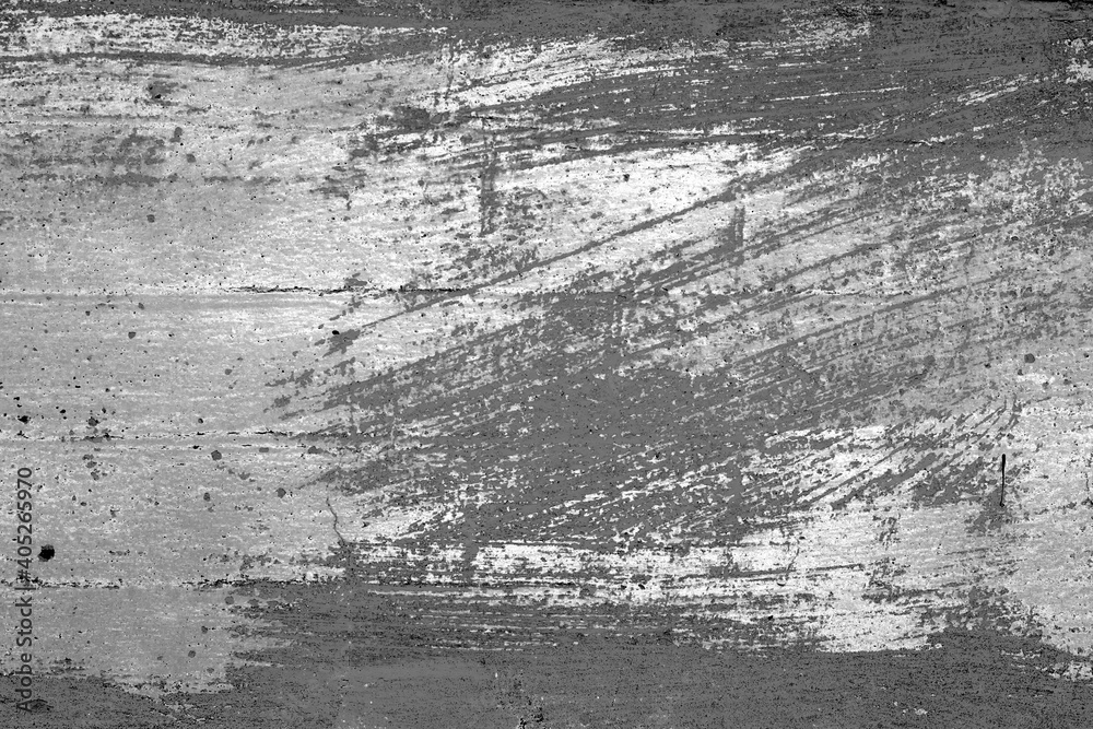 Obraz premium Texture of a concrete wall with cracks and scratches which can be used as a background