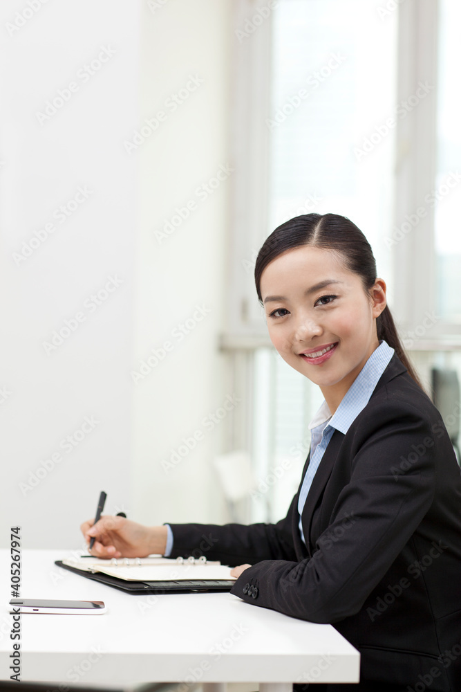 Portrait of a happy young business woman Portrait of a happy young business woman