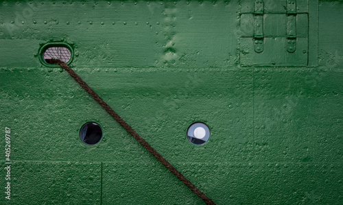 green ship hull steel texture with rope and portholes