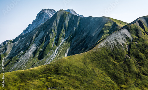 green alpine soft mountain landscape with sky