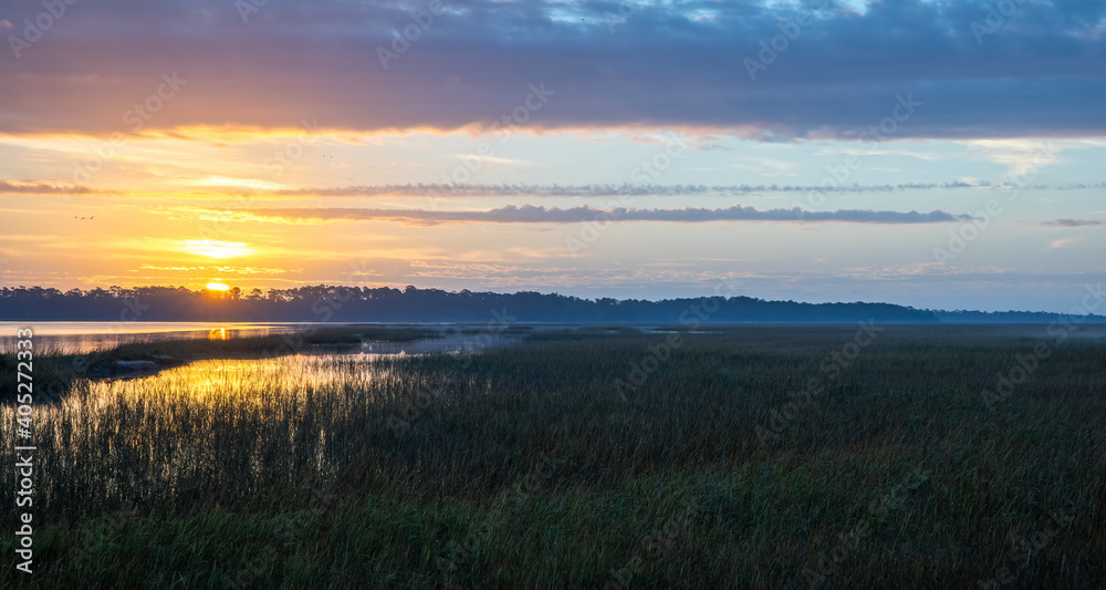 Sunrise over the salt marsh along the intracoastal waterway. 