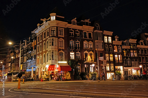 Traditional Amsterdam houses in christmas time in the Netherlands at night