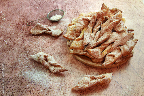 Faworki (angel wings) sprinkled with powdered sugar - traditional Polish carnival delicacy