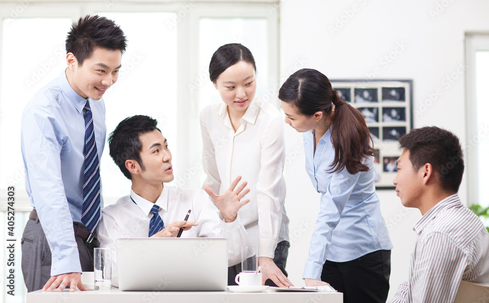 The Team of successful colleagues working together The Team of successful colleagues working together
