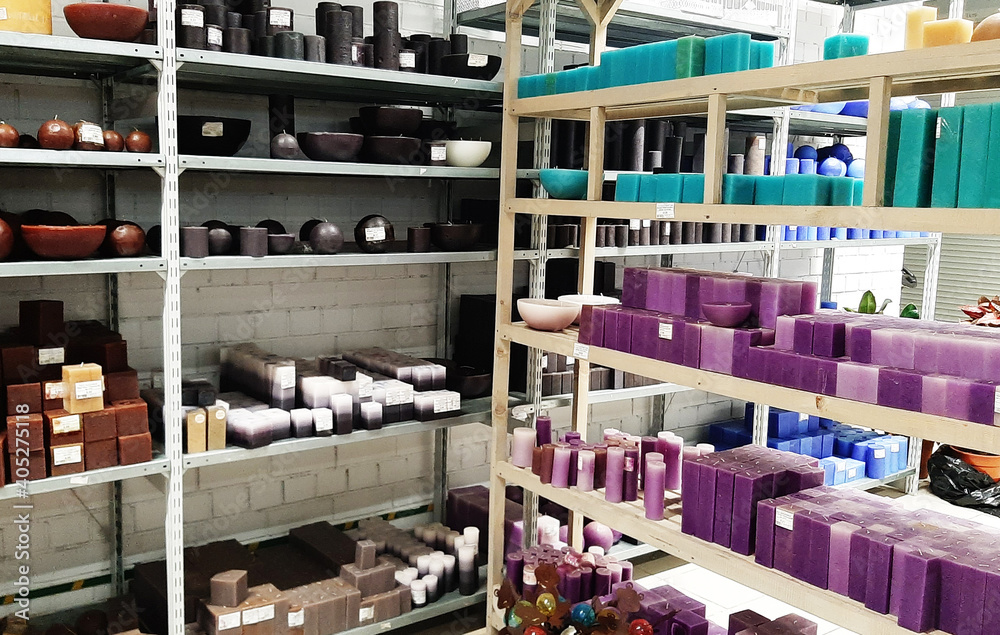 Shelves with wax candles in the interior of a home goods store. 13 January 2021, Minsk, Belarus Shelves with wax candles in the interior of a home goods store. 13 January 2021, Minsk, Belarus