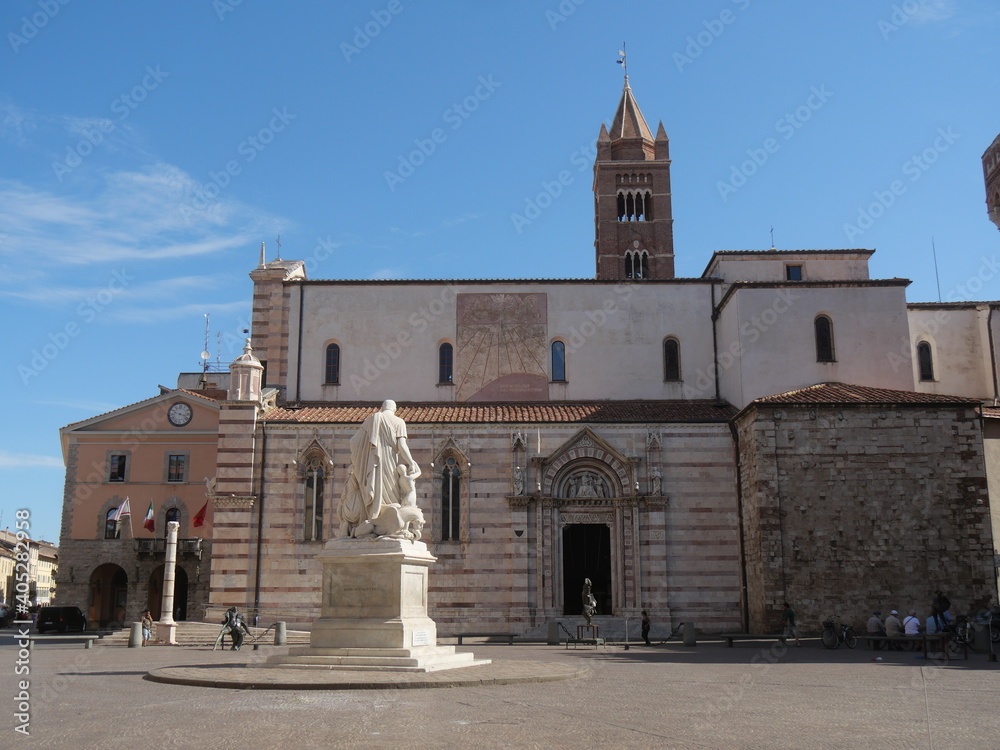 Piazza Dante is the main square of Grosseto with the side of Cathedral, Aldobrandeschi Palace and in the center the statue to Canapone.