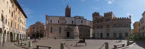 Piazza Dante is the main square of Grosseto with the side of Cathedral, Aldobrandeschi Palace and in the center the statue to Canapone.