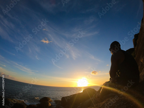 Wallpaper Mural Silhouette of a person at sunset in sea Torontodigital.ca