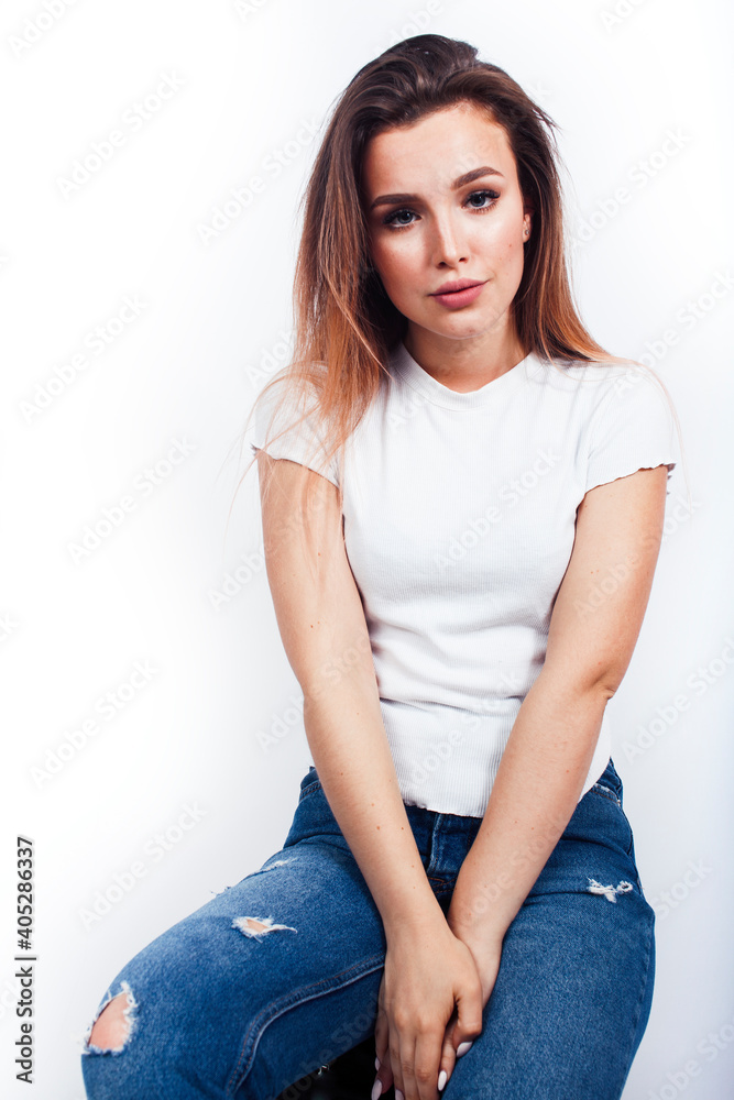 young blond woman on white backgroung gesture thumbs up, isolated emotional posing young blond woman on white backgroung gesture thumbs up, isolated emotional posing